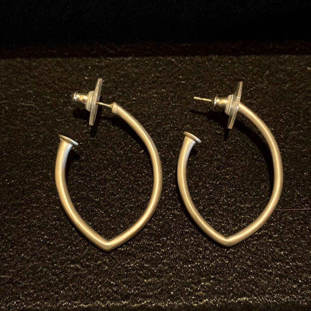 Classic medium hoop. Silver finish. Pierced.